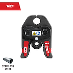 The image shows a Milwaukee Stainless Steel 1/2" M18 press tool. It has a black body with red accents and two circular jaws for pressing pipes. The tool features instructional and safety icons on its front. A pipe segment and "STAINLESS STEEL" text are shown in the bottom left corner.