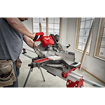 Image of the M18 FUEL™ 12” Dual Bevel Sliding Compound Miter Saw w/ ONE KEY™ being used on a jobsite