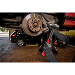 Worker using the 24oz Steel Ball Peen Hammer