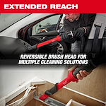 Image showing the AIR-TIP™ 3-in-1 Crevice and Brush Tool being used in two different cleaning scenarios: cleaning the interior of a car and cleaning under a cabinet. The text reads "Extended Reach" and "Reversible Brush Head for Multiple Cleaning Solutions."