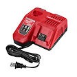 Red M18 and M12 Rapid Charger with a black power cord and two charging slots. Brand name and indicators shown on the top.