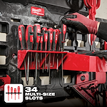 Milwaukee Packout Screwdriver Rack with 34 multi-size slots, holding various red-handled screwdrivers on a black wall mount.