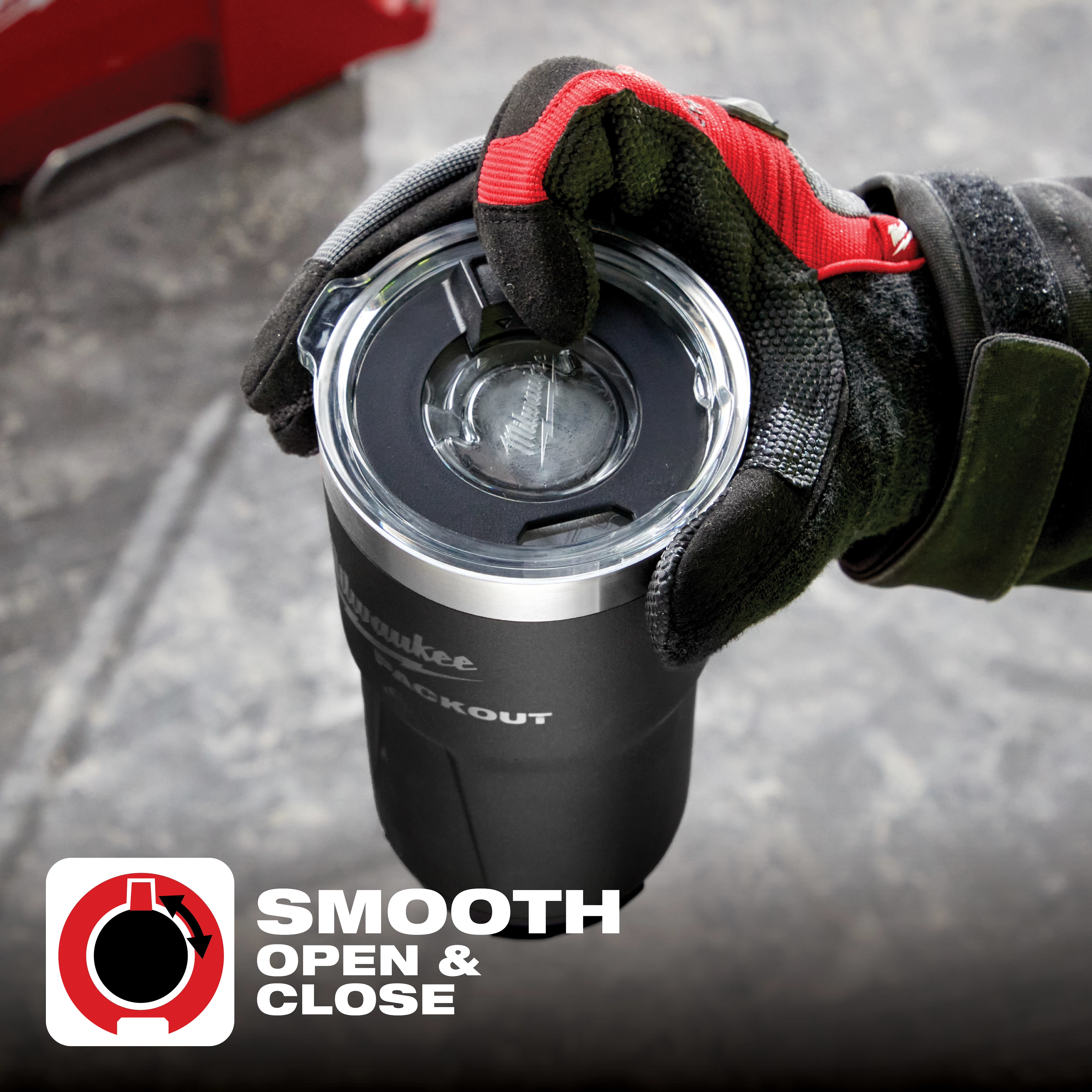 Gloved hand holding a black PACKOUT thermal tumbler with a clear lid. Text reads "Smooth Open & Close" with an icon.