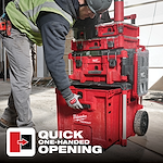 A worker uses one hand to open the Milwaukee Packout storage system. Text overlay reads, "Quick One-Handed Opening."